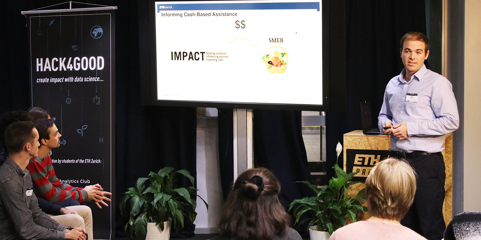 student presenting their project to other students and NGOs