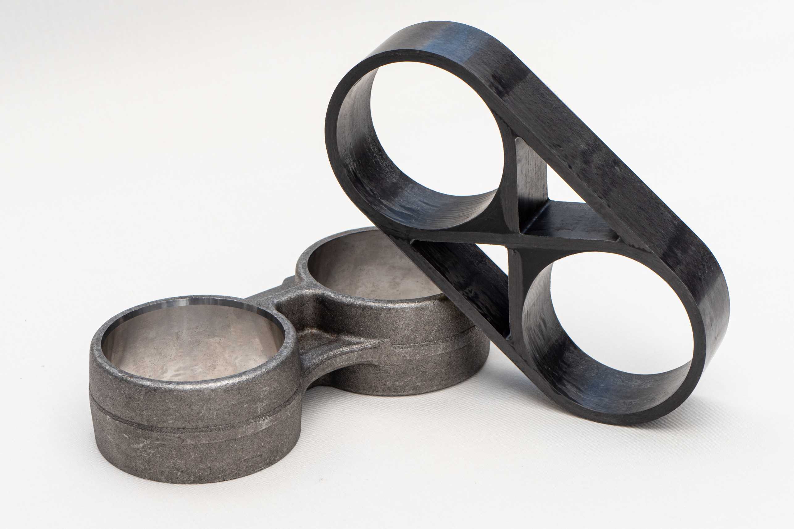 identical metal and CFRP car part