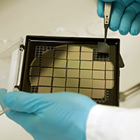 person assembling a chip