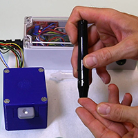 Person taking a blood sample with new device