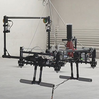 Drone with drill approaching wall