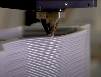 robot at work, shaping a mould