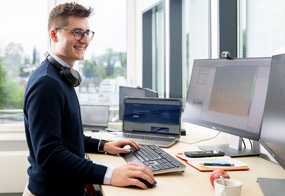 Markus at his desk in front of the computer