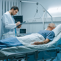 patient in hospital bed, doctor, nurse