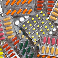 various packets with pills